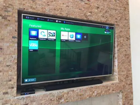 Outdoor TV installation on covered patio in Southern California