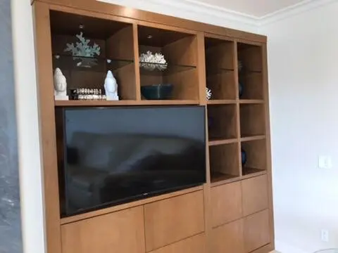 Professional Sonos soundbar installation below mounted TV