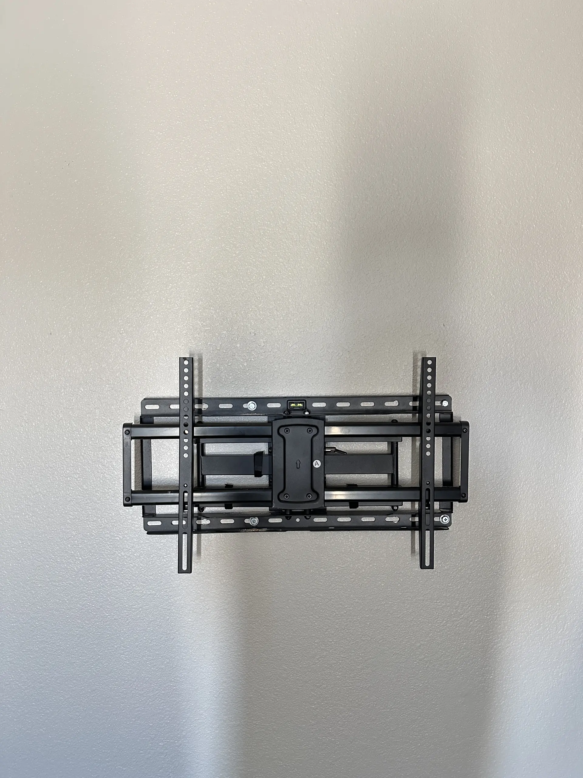 In-wall cable concealment for TV mounting